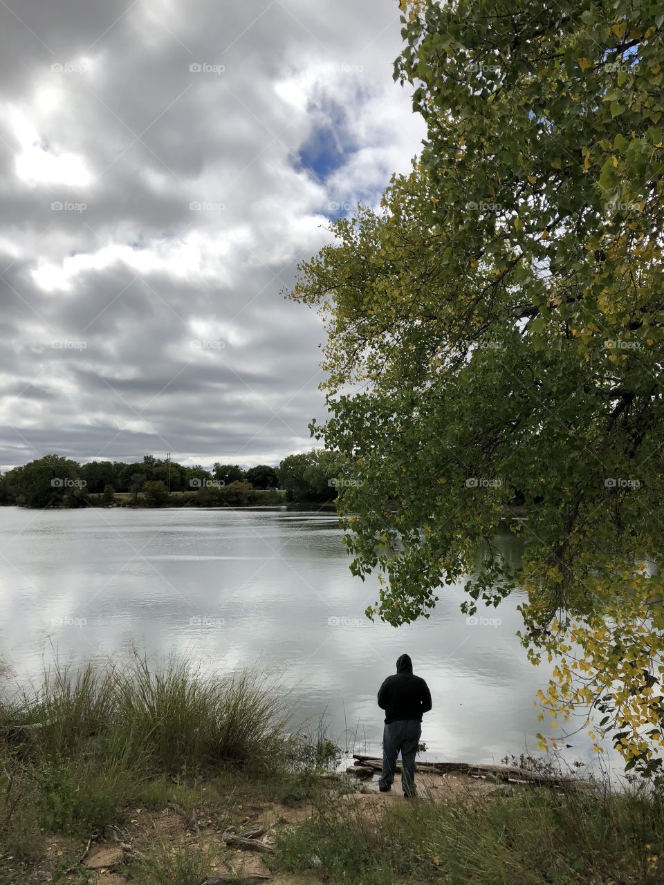 Person at the park on a gloomy but beautiful cool Fall day