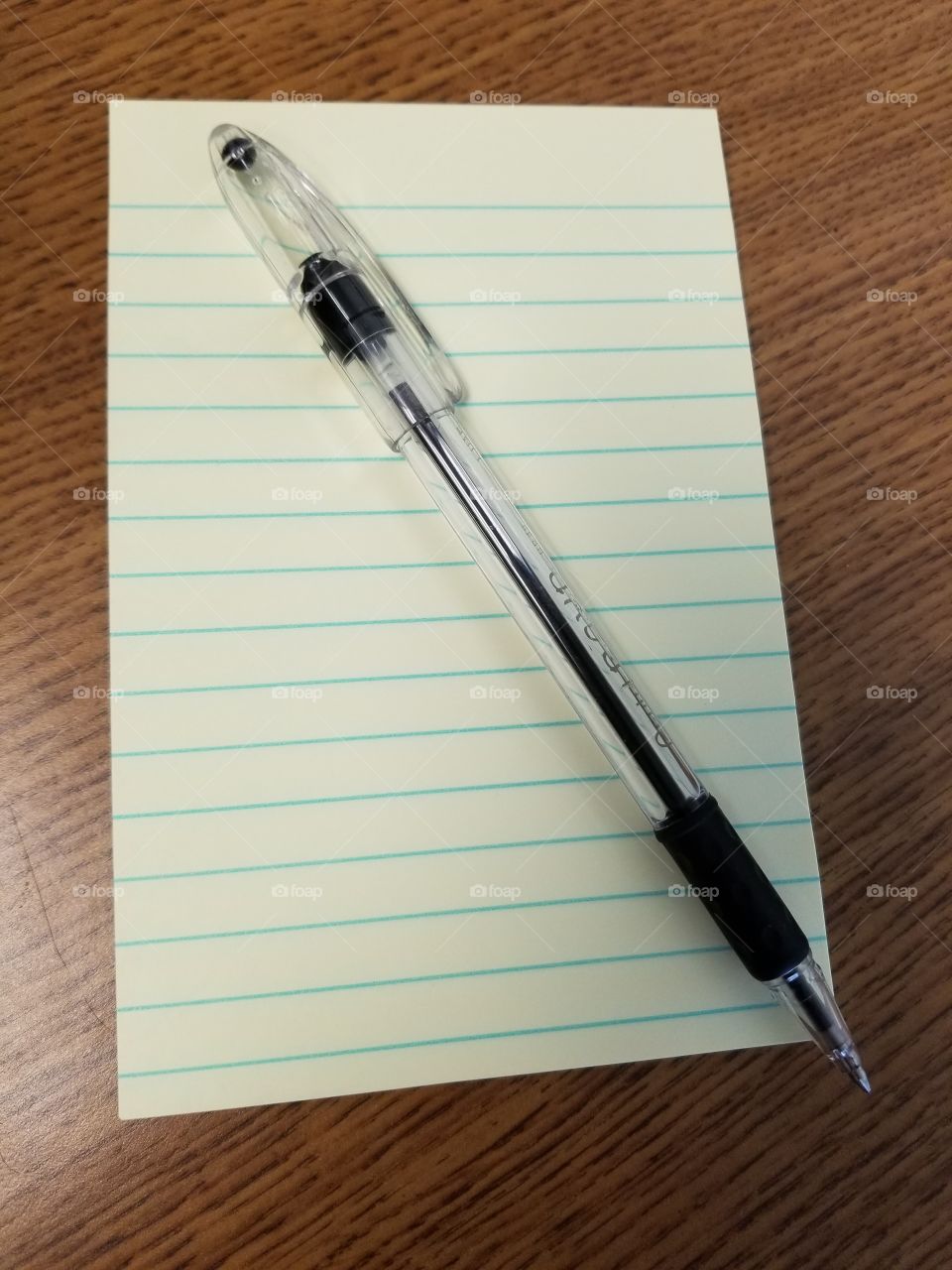 Pen on notepad.