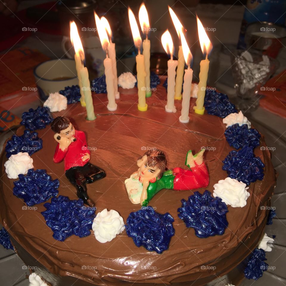Finished Birthday Cake, Candles Burning, Chocolate Frosting with plastic figuerines!