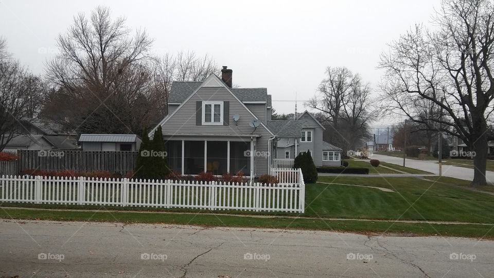 In a small Indiana town, gray houses sit patiently waiting for the first snow of the year.