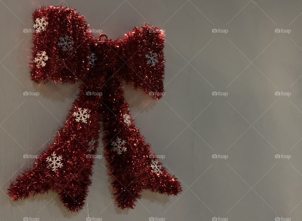 Red ribbon on the wall