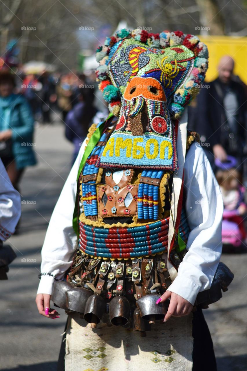 Kukeri are elaborately costumed Bulgarian man, who perform traditional rituals intended to scare away evil spirits. Until recently, all Kukeri were man, but now we can also see women 🙂