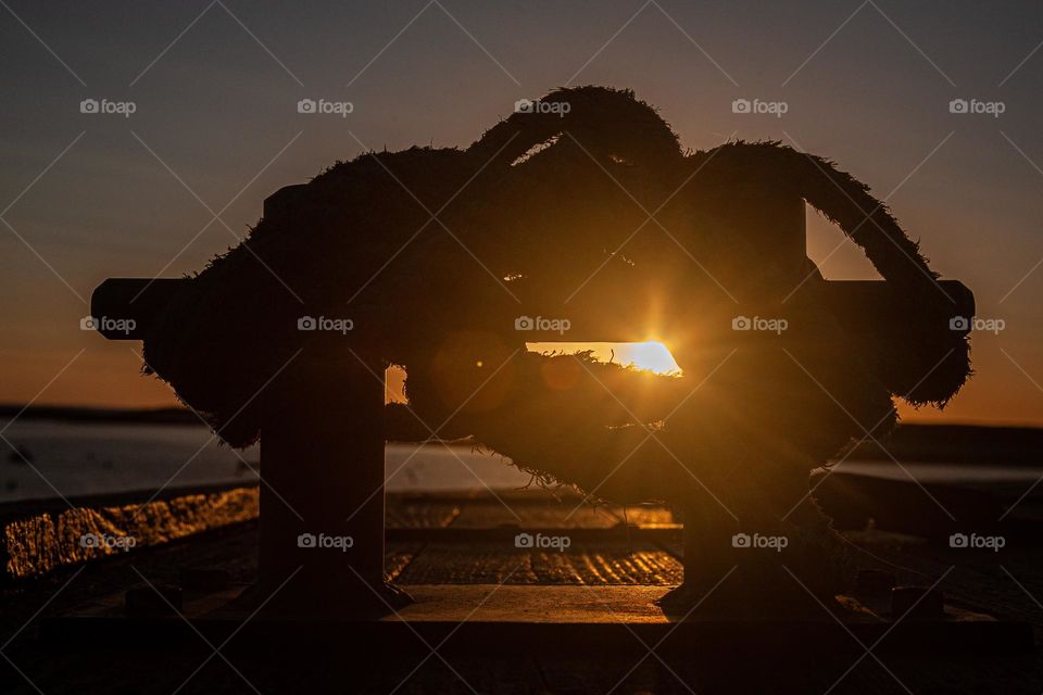 Sunset rays on pier