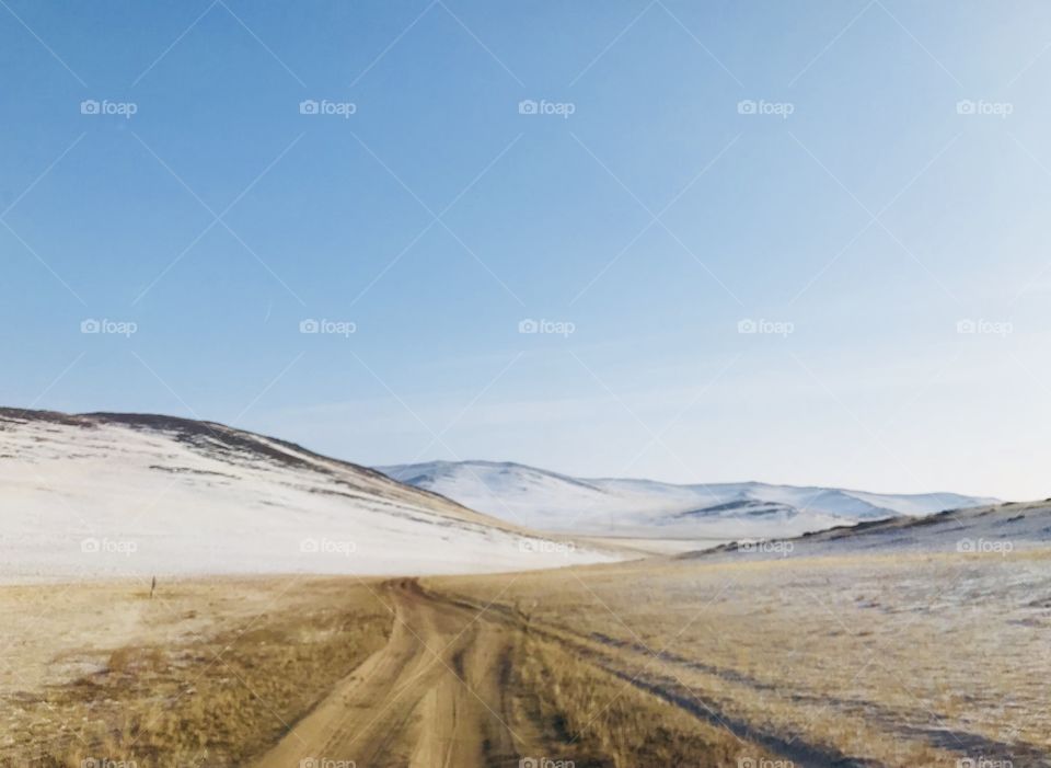 Somewhere on the way to Ice bubble zone that the grass was ljke gold contrast with white of snow.Looks nice like a miracle.