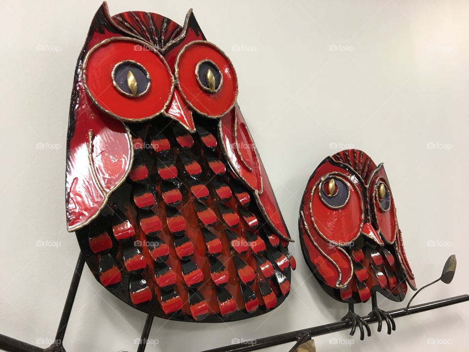 Red owl metal sculpture 