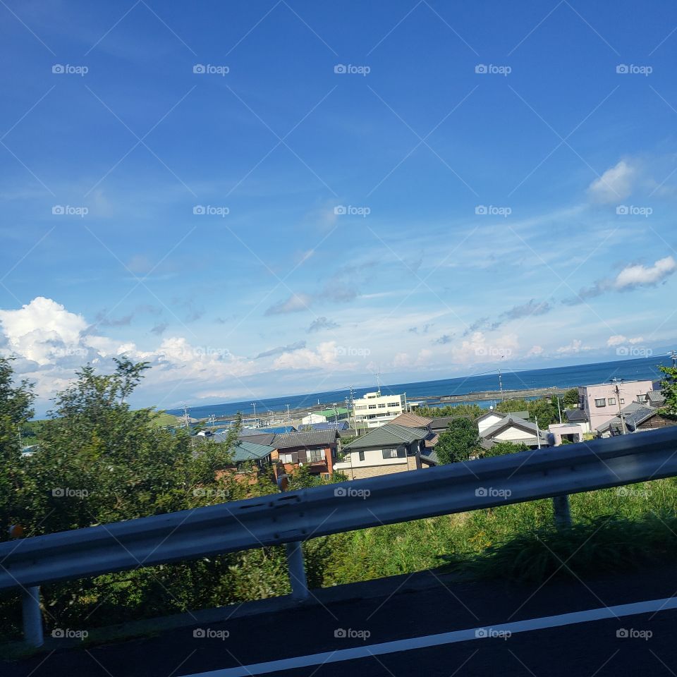 just take a quick picture beside the road