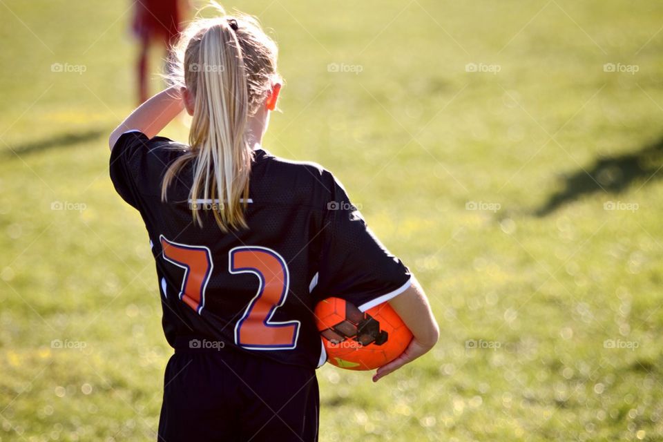 Girl playing soccer 