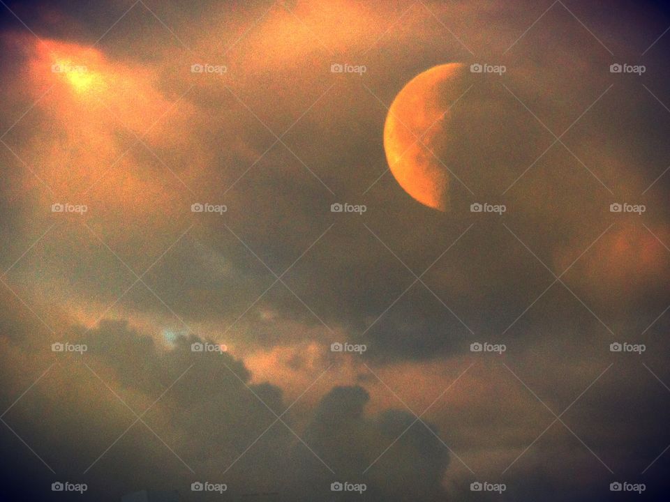 Sunset over Naples  with the moon ( Italy ).