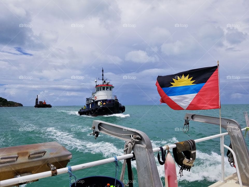 This was pretty cool watching this tug boat pull some pontoon along the Caribbean sea