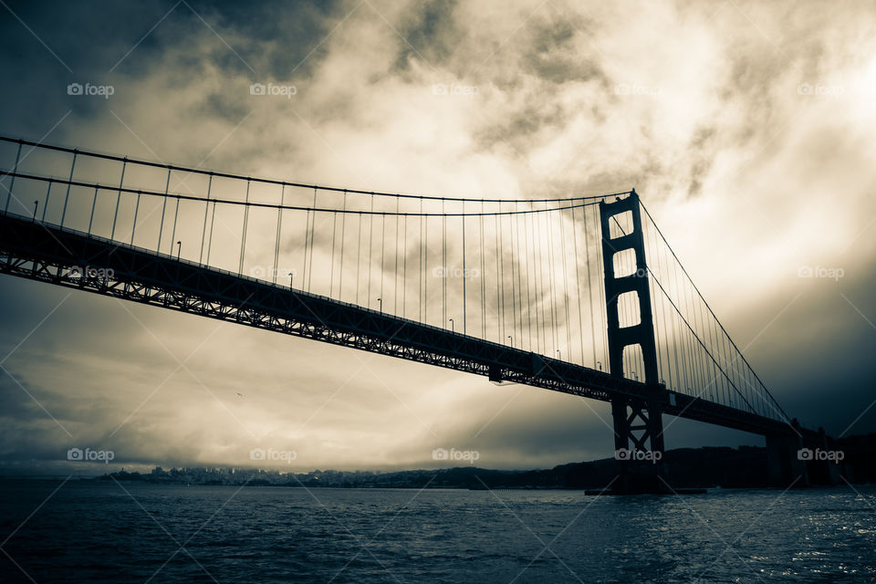 Not So Golden. Angry clouds swirling in past the iconic Golden Gate Bridge. San Francisco, CA