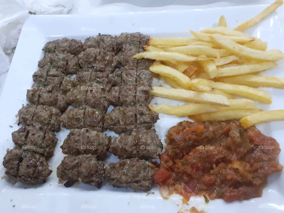 minced meat and french fries And tomato sauce