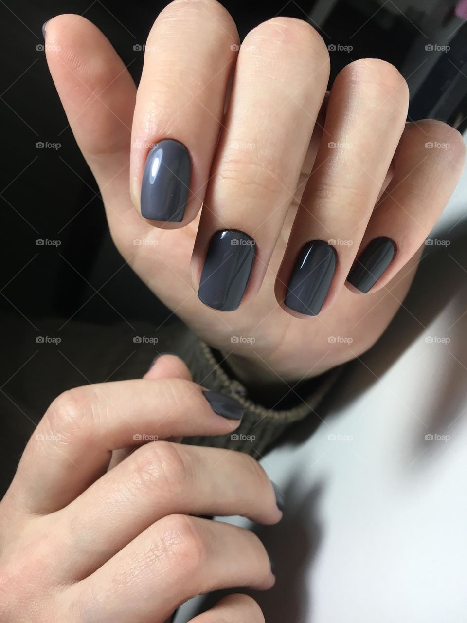 Painted nails, gel polish on nails, women's beautiful and neat manicure