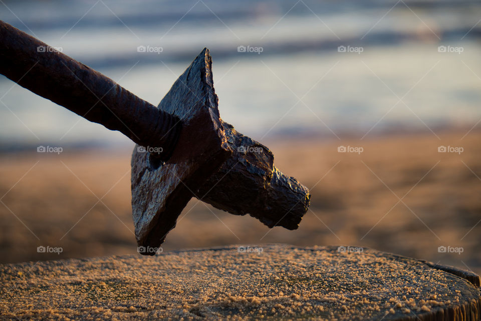 rusted nut and bolt on beach