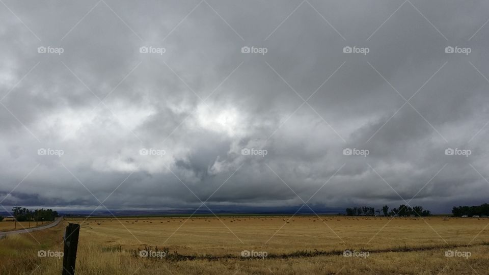 Ominous low storm clouds on the prairie