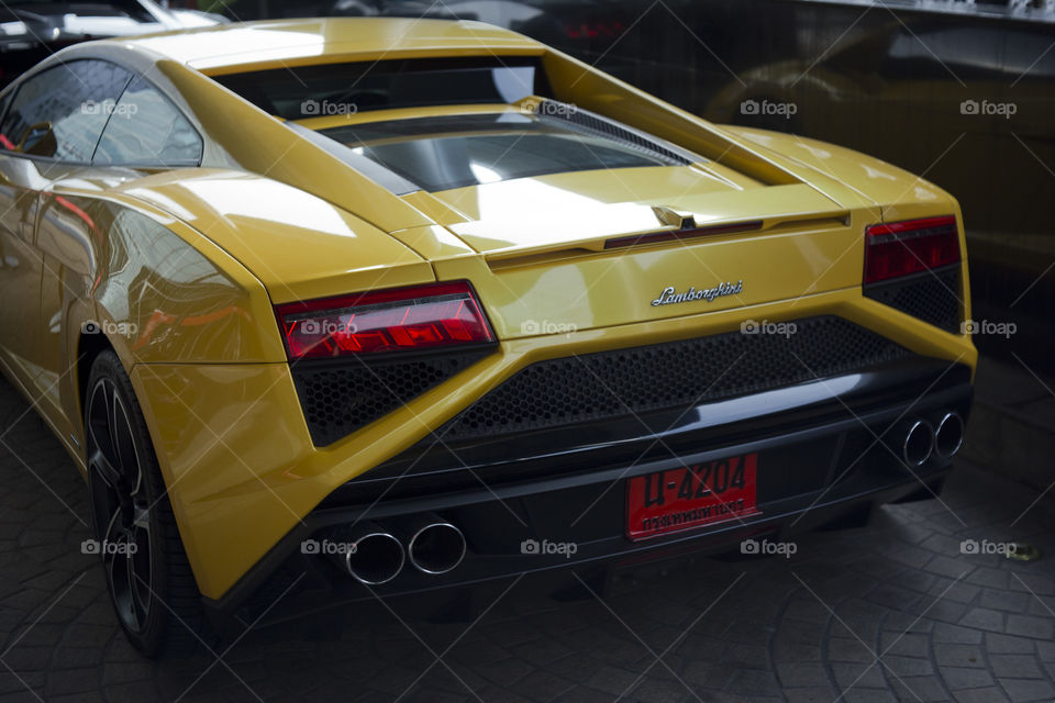 rear of Yellow Lamborghini Gallardo squadra corse special edition coupe