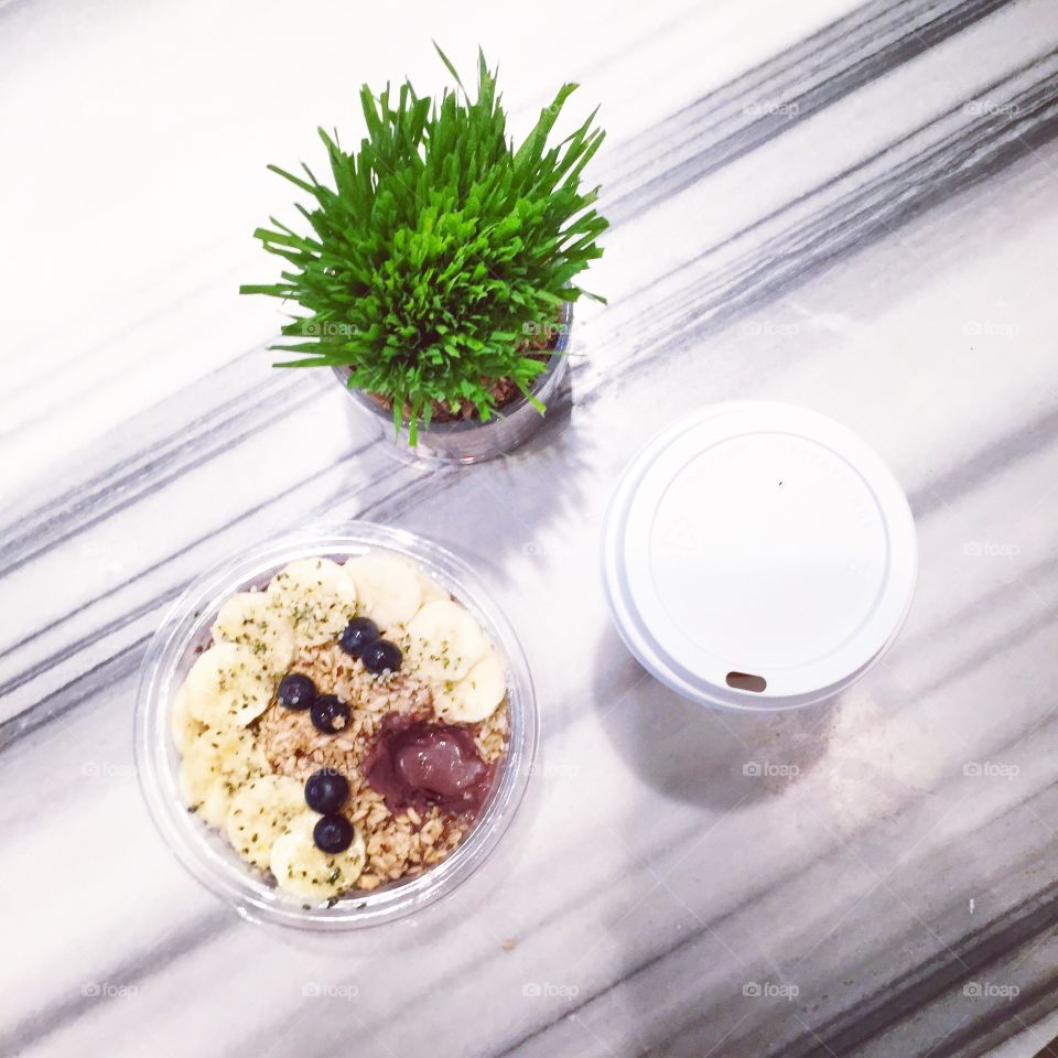 Acai bowl. Protein packed acai bowl, coffee, plant