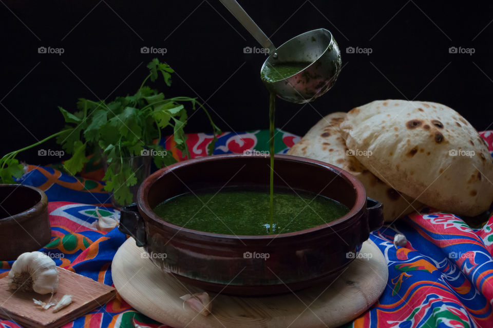 Green Molokhya soup. Egyptian cuisine