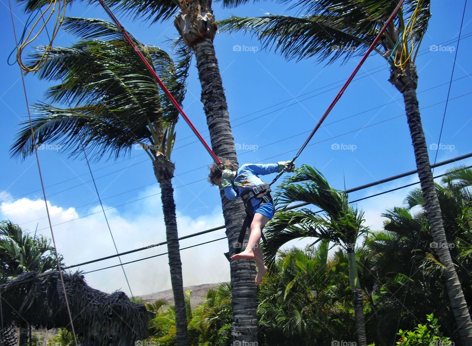 Boy On Bungee Swing
