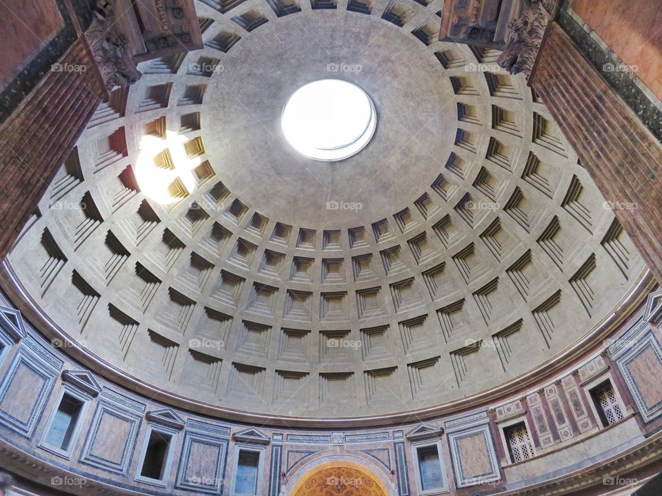 Pantheon's ceiling view from main entrance low angle. Rome