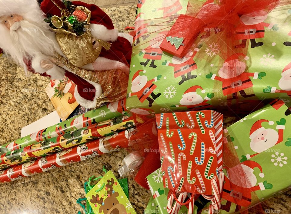 Christmas wrapping, candy canes and Christmas music getting ready for Santa!