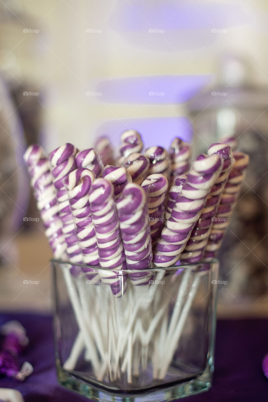 Grape Swirl Candy Lollipops in a Candy Jar