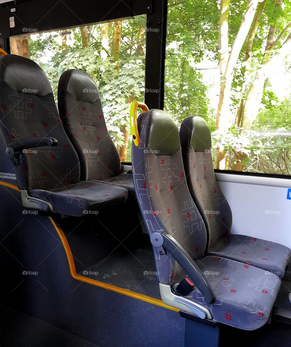Bus seats with hashtag pattern.