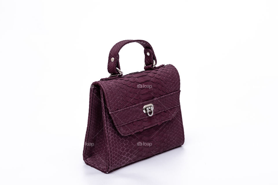 Bag made of python skin.  Handwork.