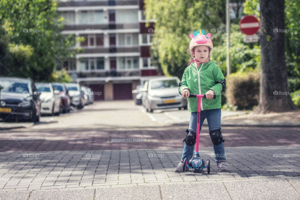 A child with a scooter 