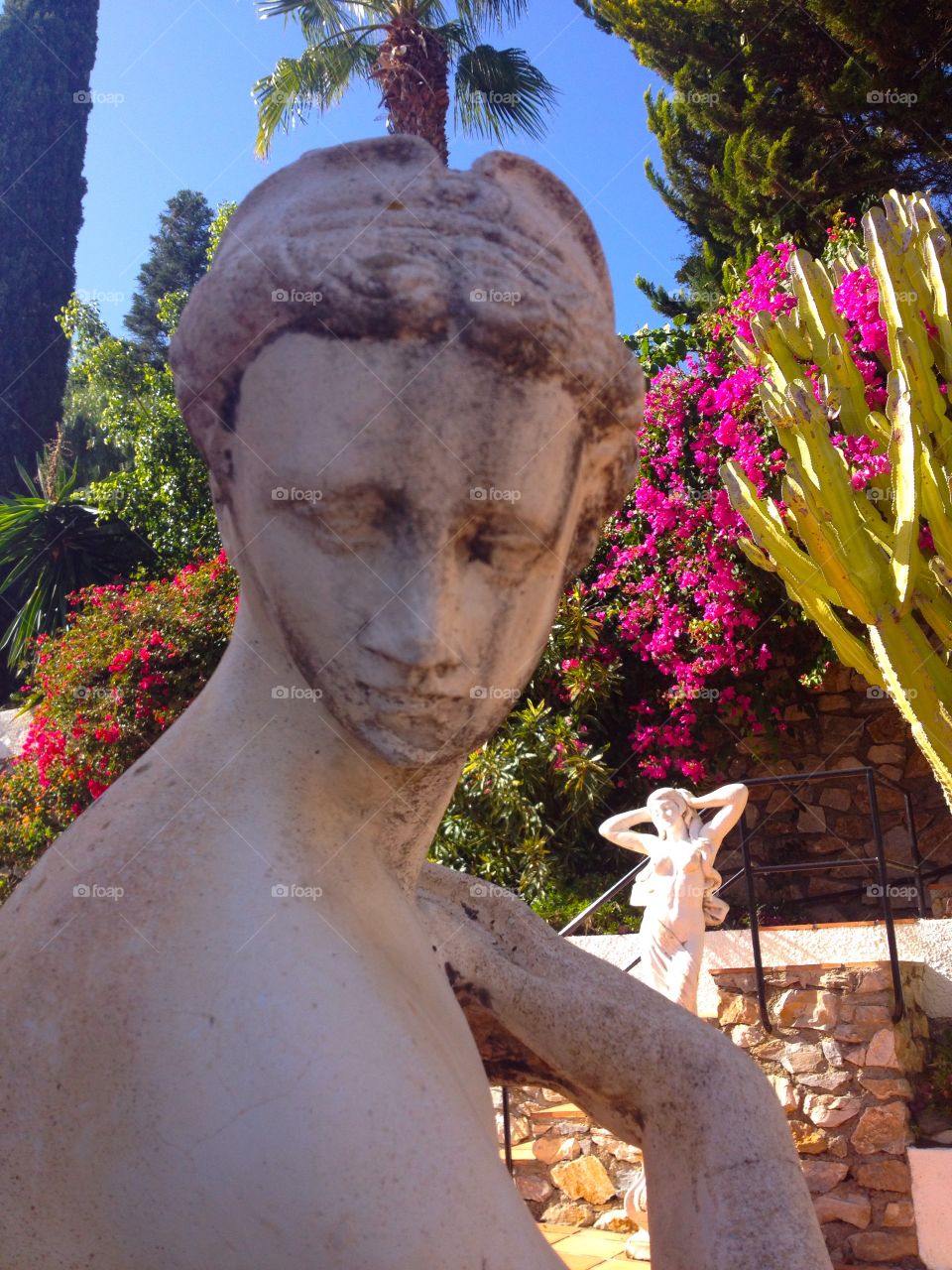 Statues . In a beautiful garden in Almunecar