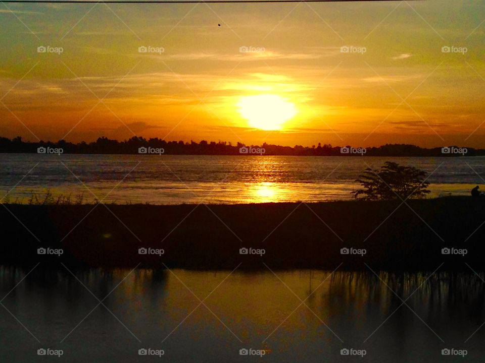 Beautiful sun rises. The sun rises at 6:00 am in Phnom Penh Cambodia .