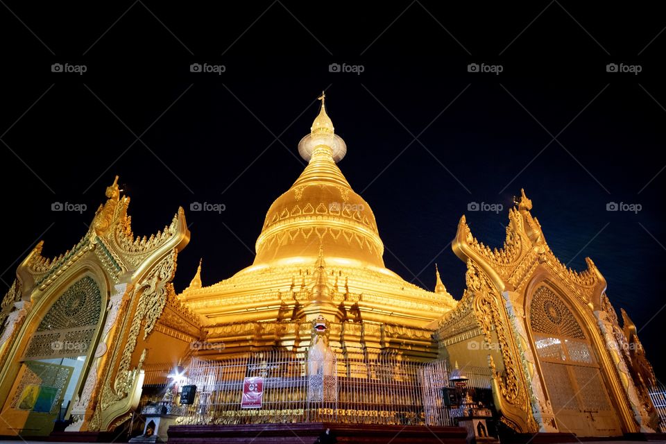 Rangoon/Myanmar:Beautiful golden light of  Maha Wizaya Pagoda in the night