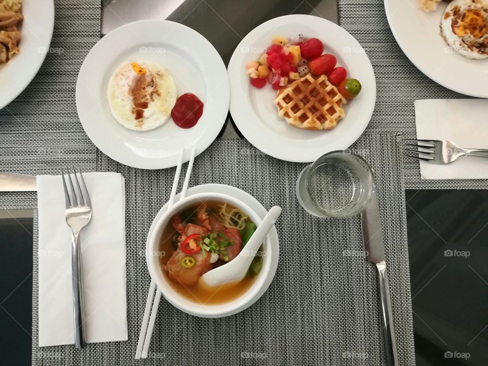 breakfast set including noodle, egg and sweet