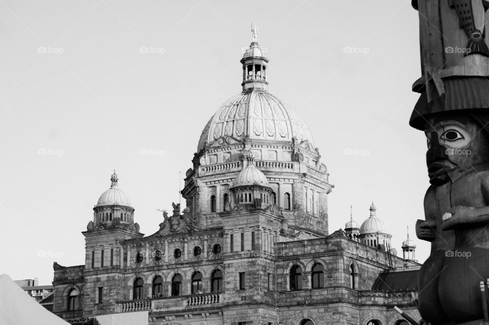 Ornate building. Photo taken in Canada.  Black and white building with ornate details and domes.