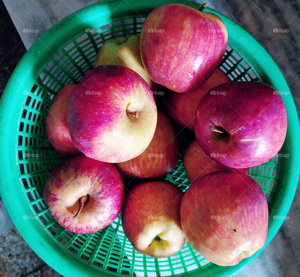 An apple a day keeps the doctor away. Lustrous red of the apples is beautiful as well as nutritious