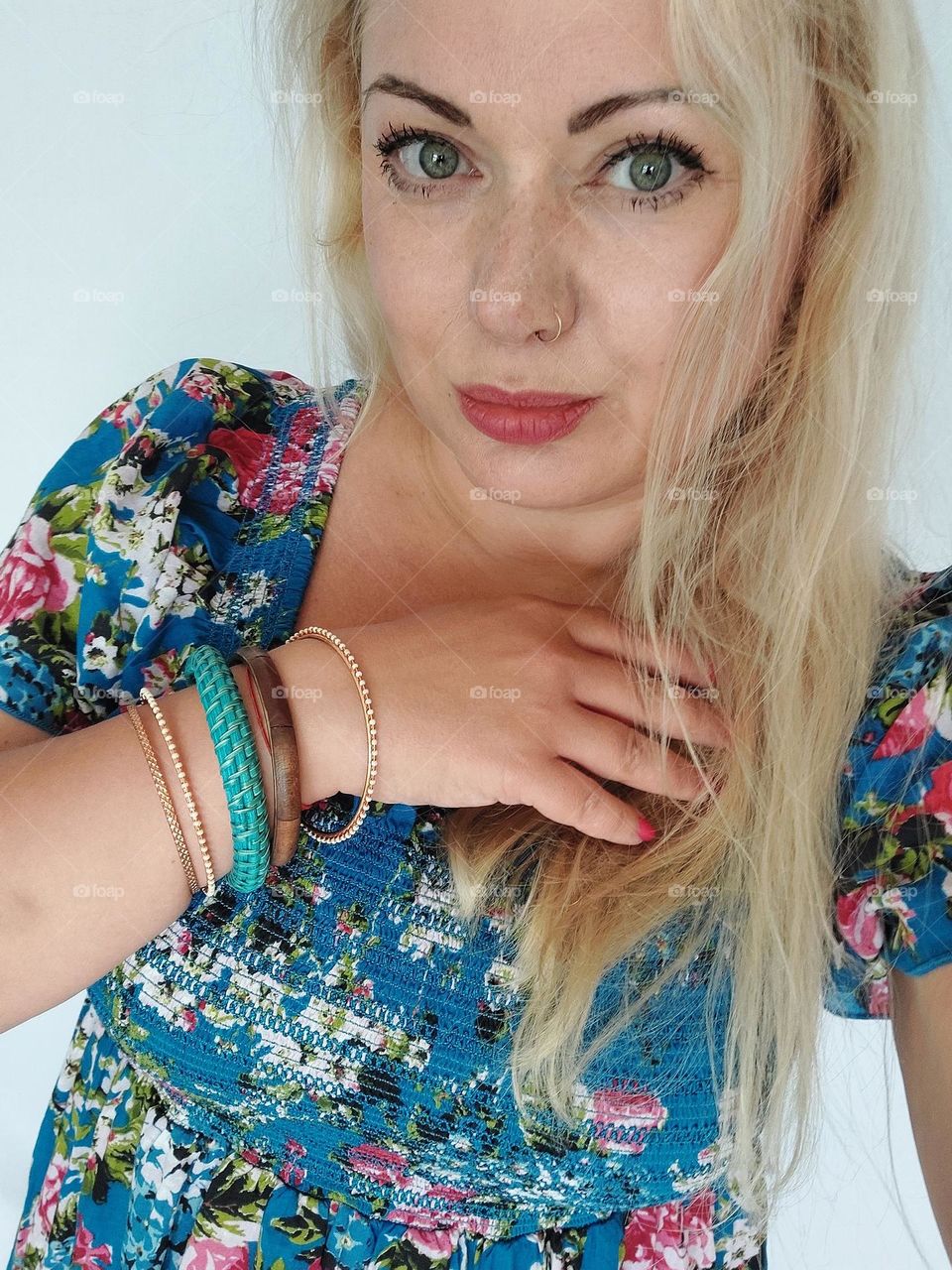 blonde woman with bracelets