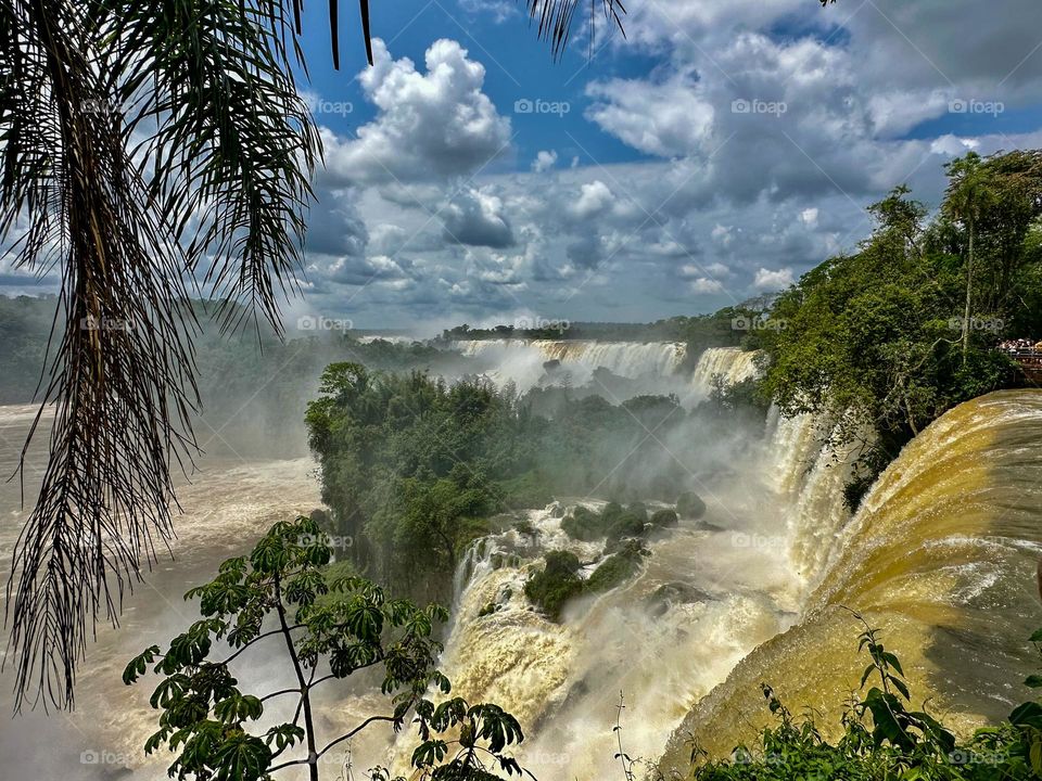 The waterfalls in Iguazu between Argentina and Brazil. One of the seven wonders of the natural world in the midst of rocks and green mountains