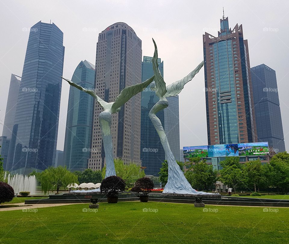 Modern skyscrapers seen from Lujiazui Central Green Space, Shanghai, China. Taken in May 2018.
