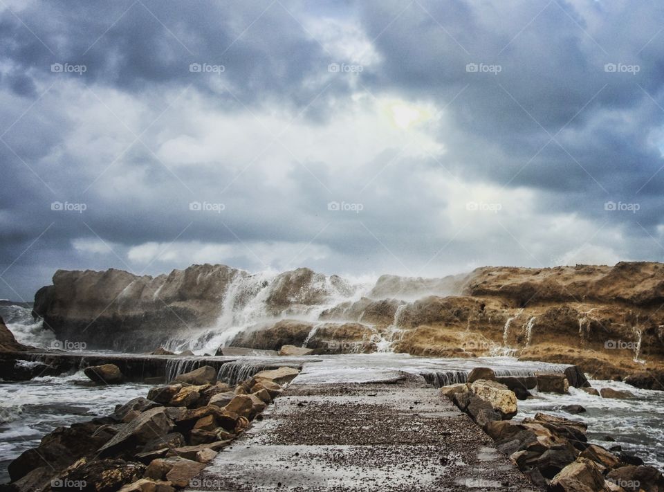 waterfalls and a rock