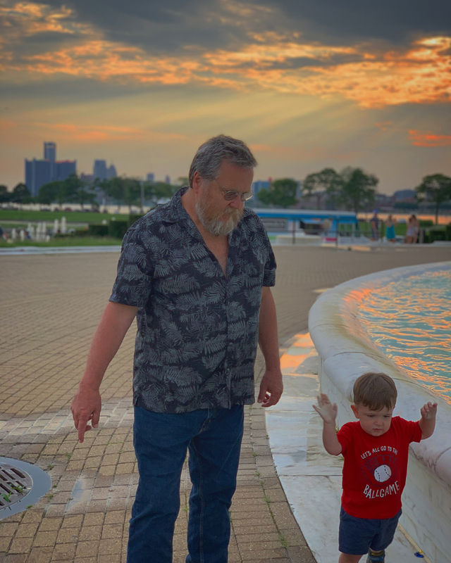 Just a papa and his boy on Belle Isle, Detroit. 