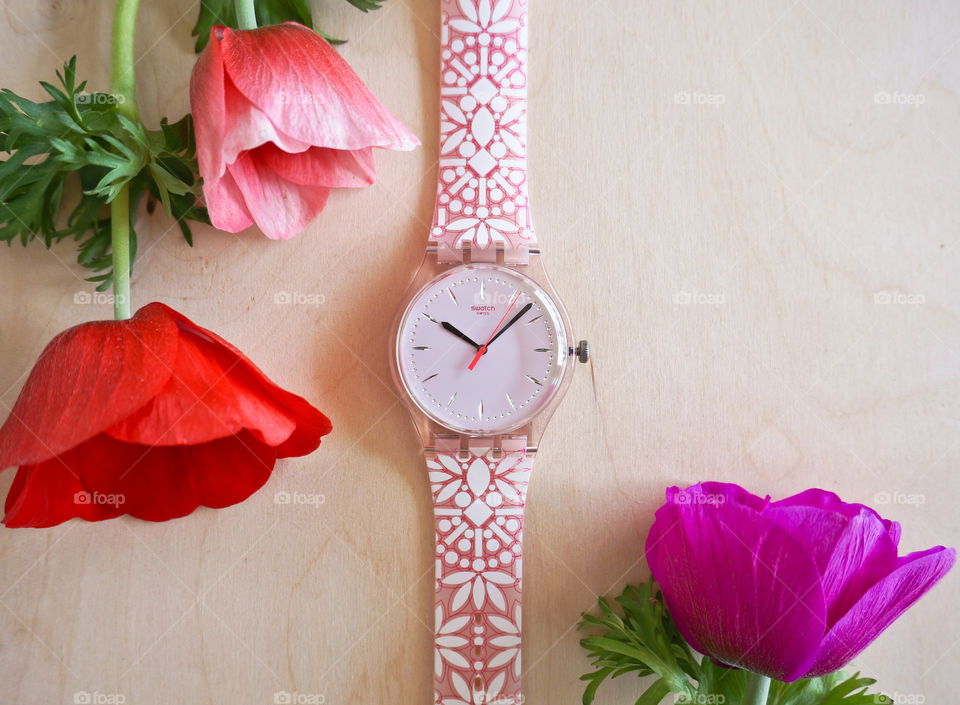 Rose transparent swatch watch and flowers