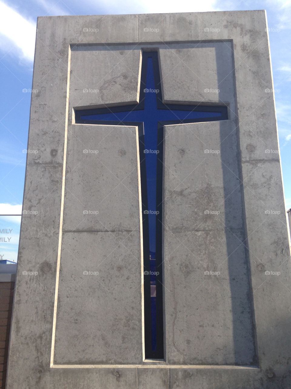 At the cross. Jesuit high school symbol