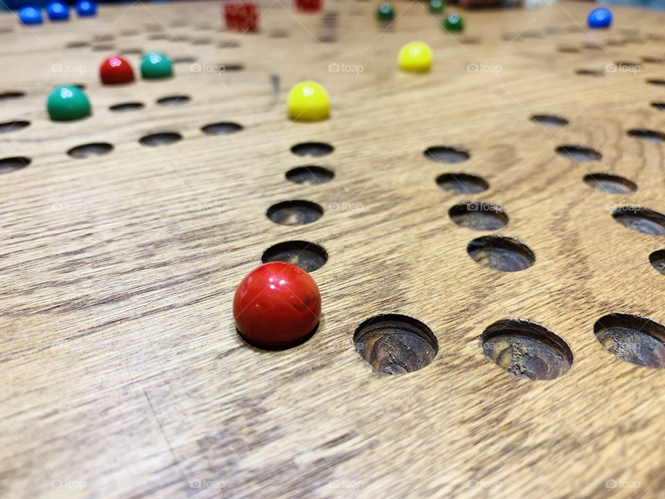 Board game with marbles