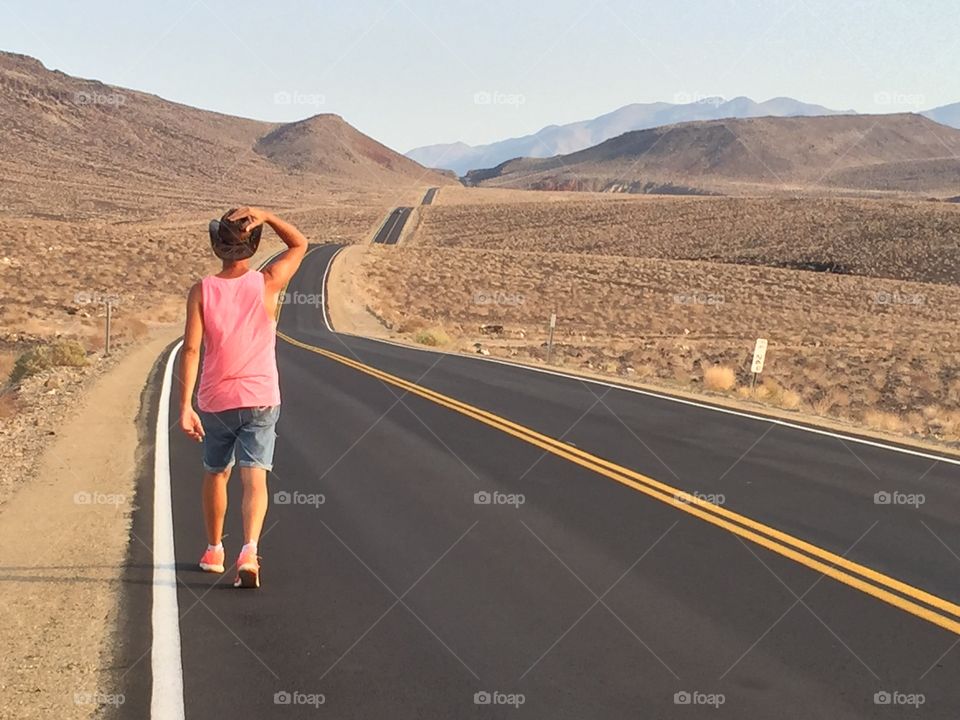 Man in the desert road