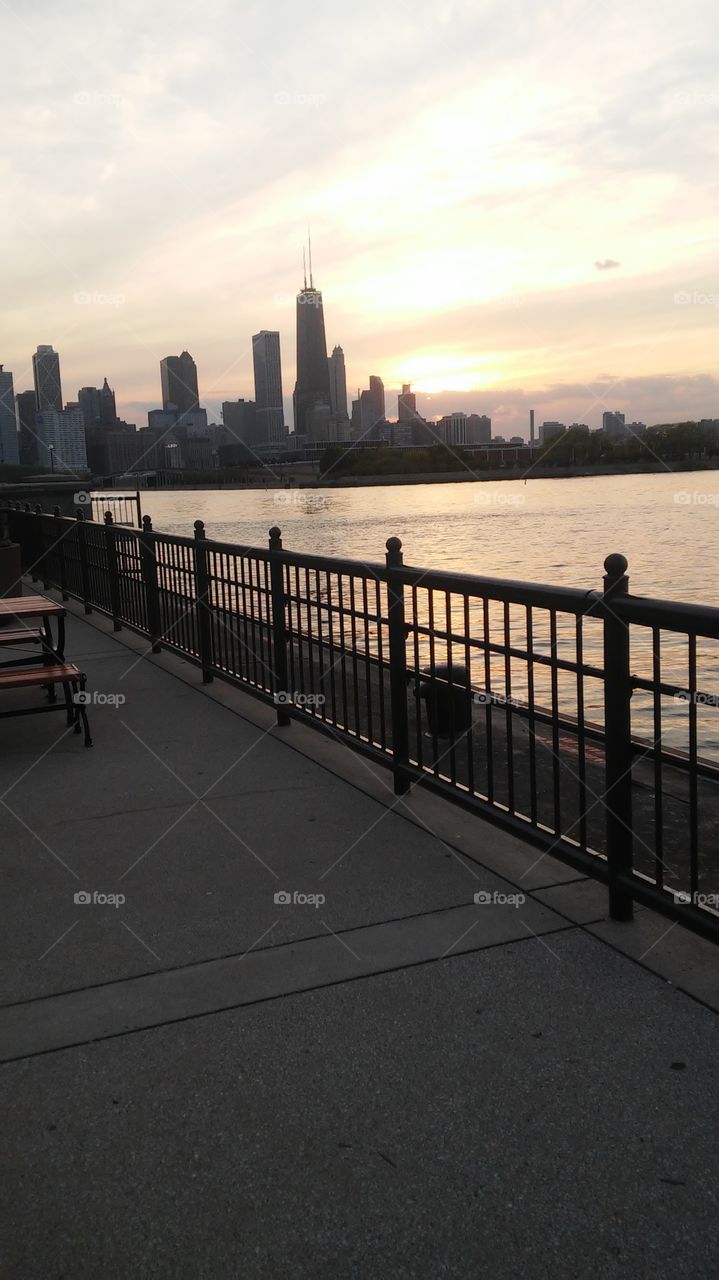 Chicago skyline back against the sunset