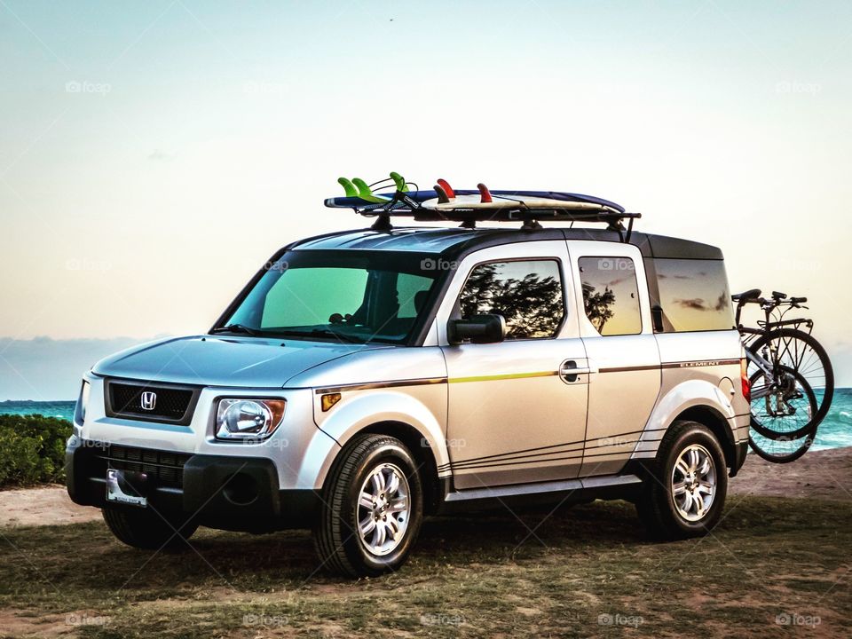 Honda Element SUV ready for a beach adventure of surfing and bicycle riding. 