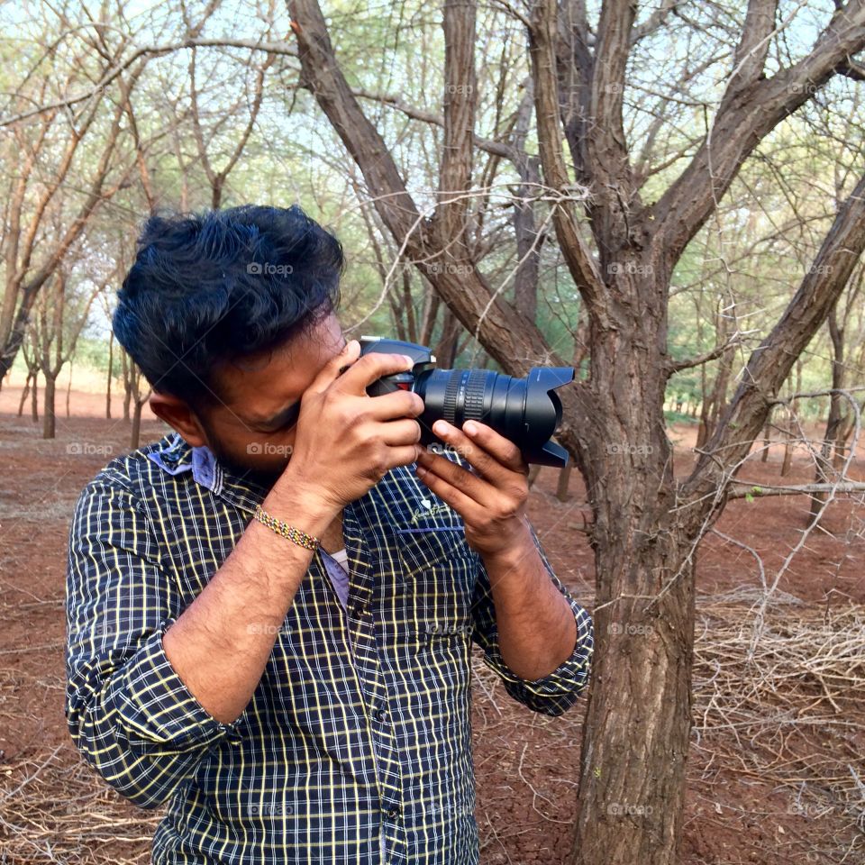 Man taking picture in camera