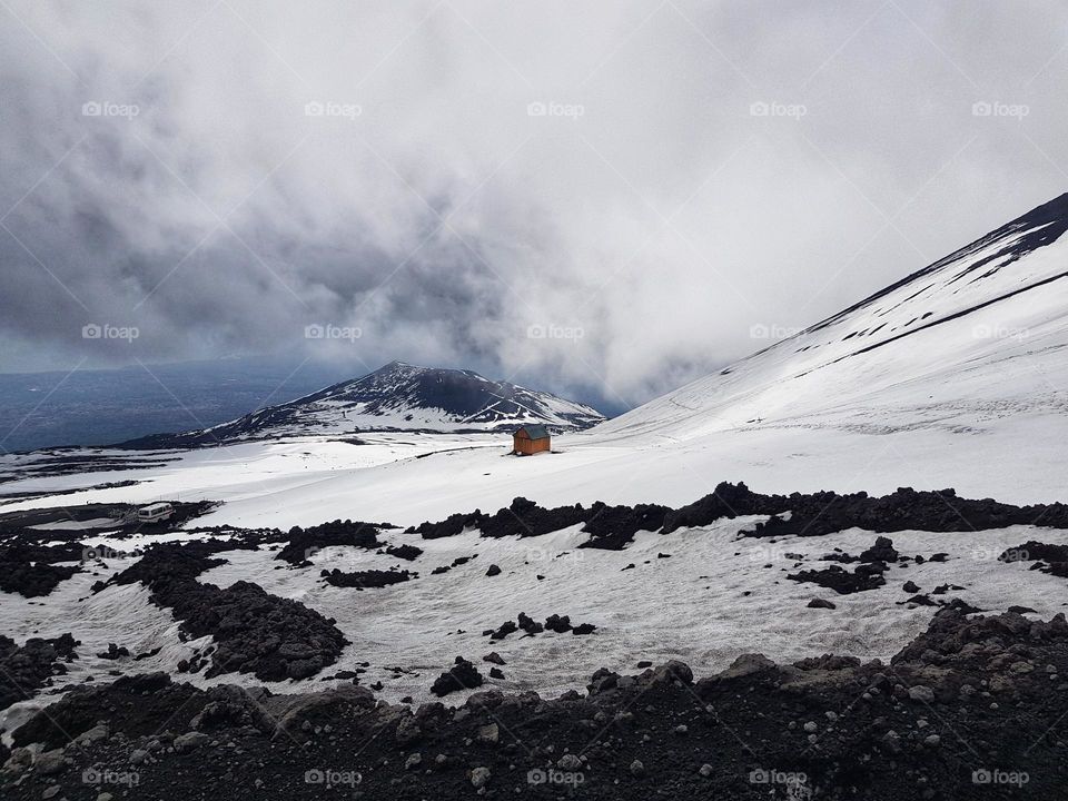 Beautiful view when a mountain and cloud meet.