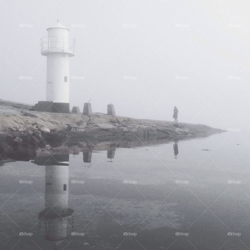 Misty lighthouse