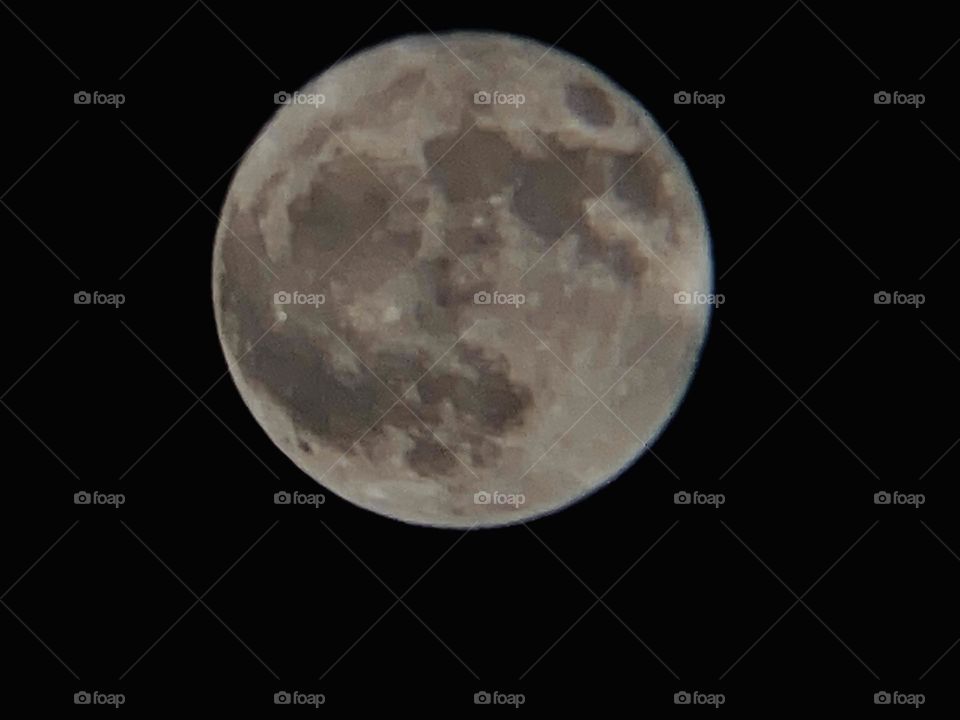 Full moon captured by mobile phone with telephoto lens