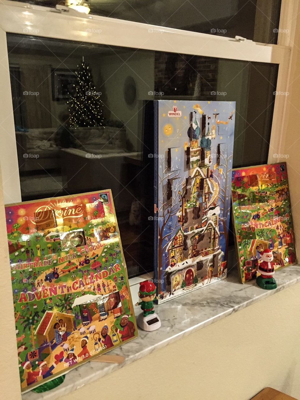 Advent Calendars and Christmas Tree Window Reflection. Advent Calendars and Christmas Tree Window Reflection